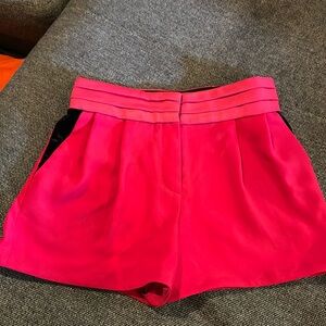 The Kooples pleated red shorts with black velvet trim